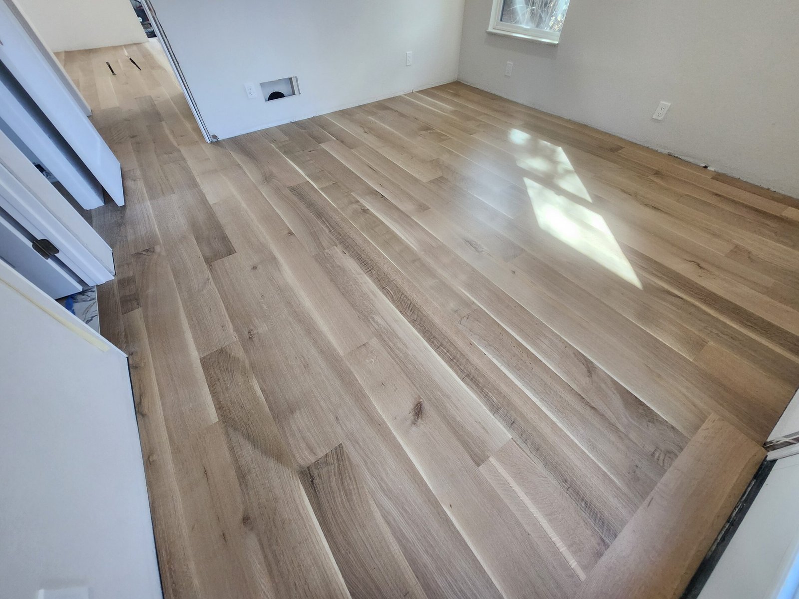 Red oak natural color in traditional home - warm tones and prominent grain