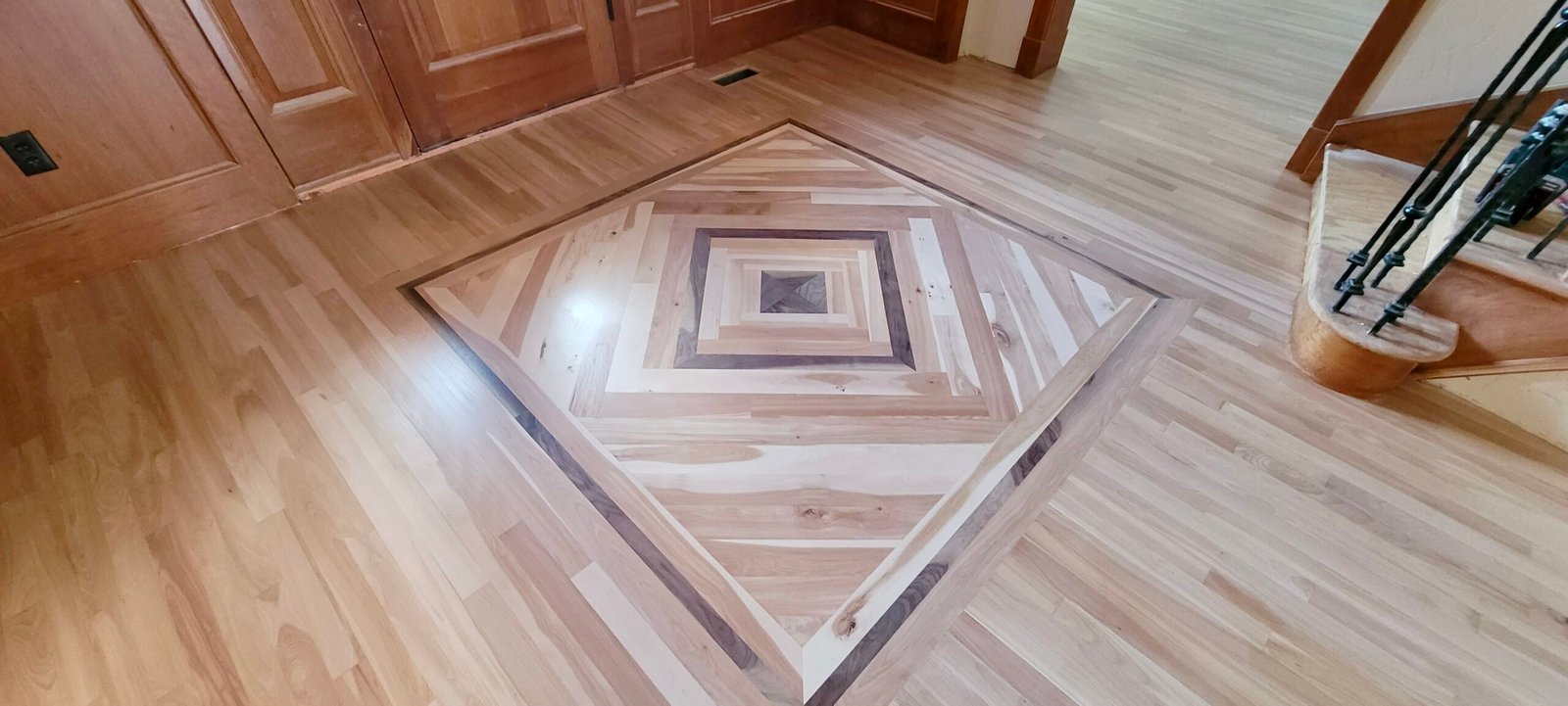 Hardwood floor installer with custom designs in firestone.