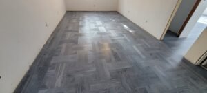 Gray hardwood flooring in empty room