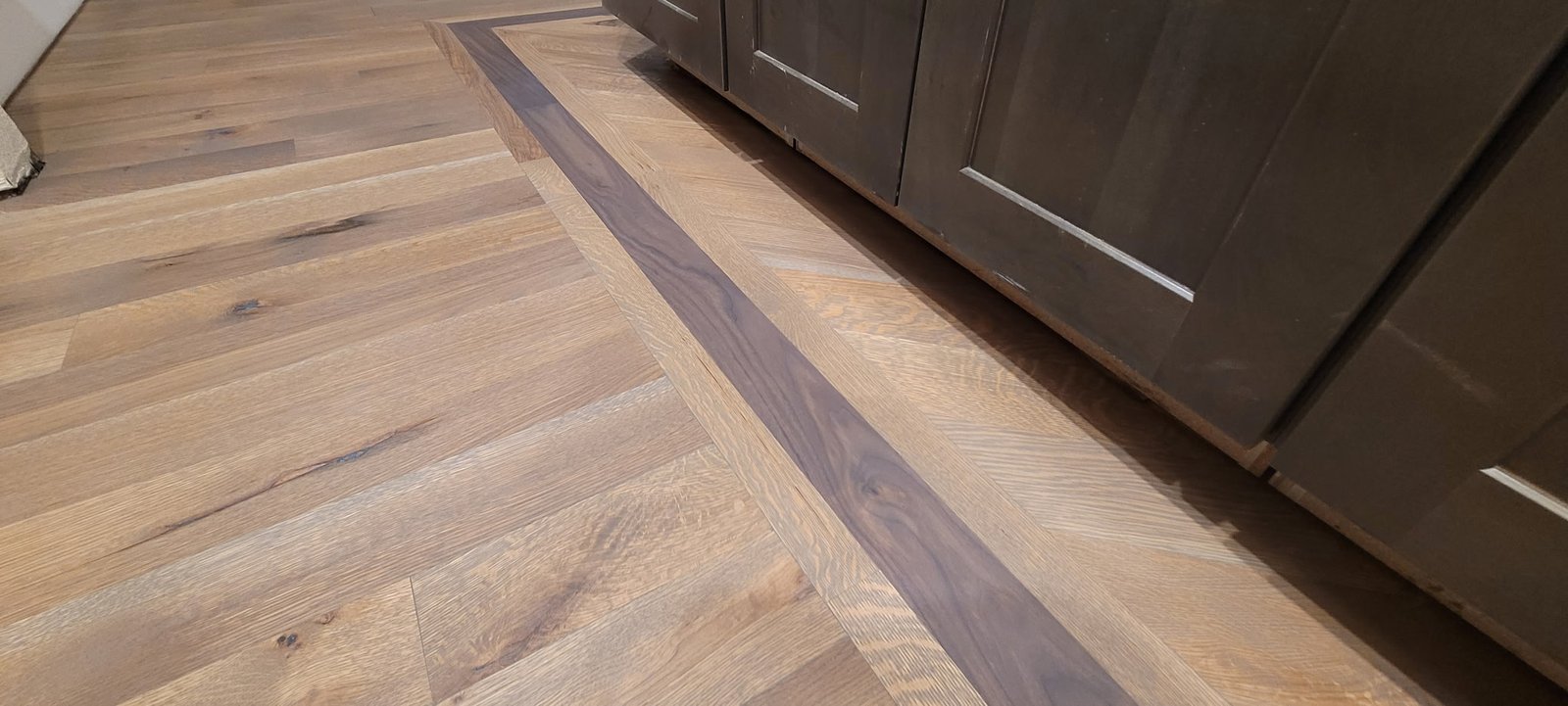 White oak hardwood floor install herringbone border white oak installed hardwood floor in longmont 11